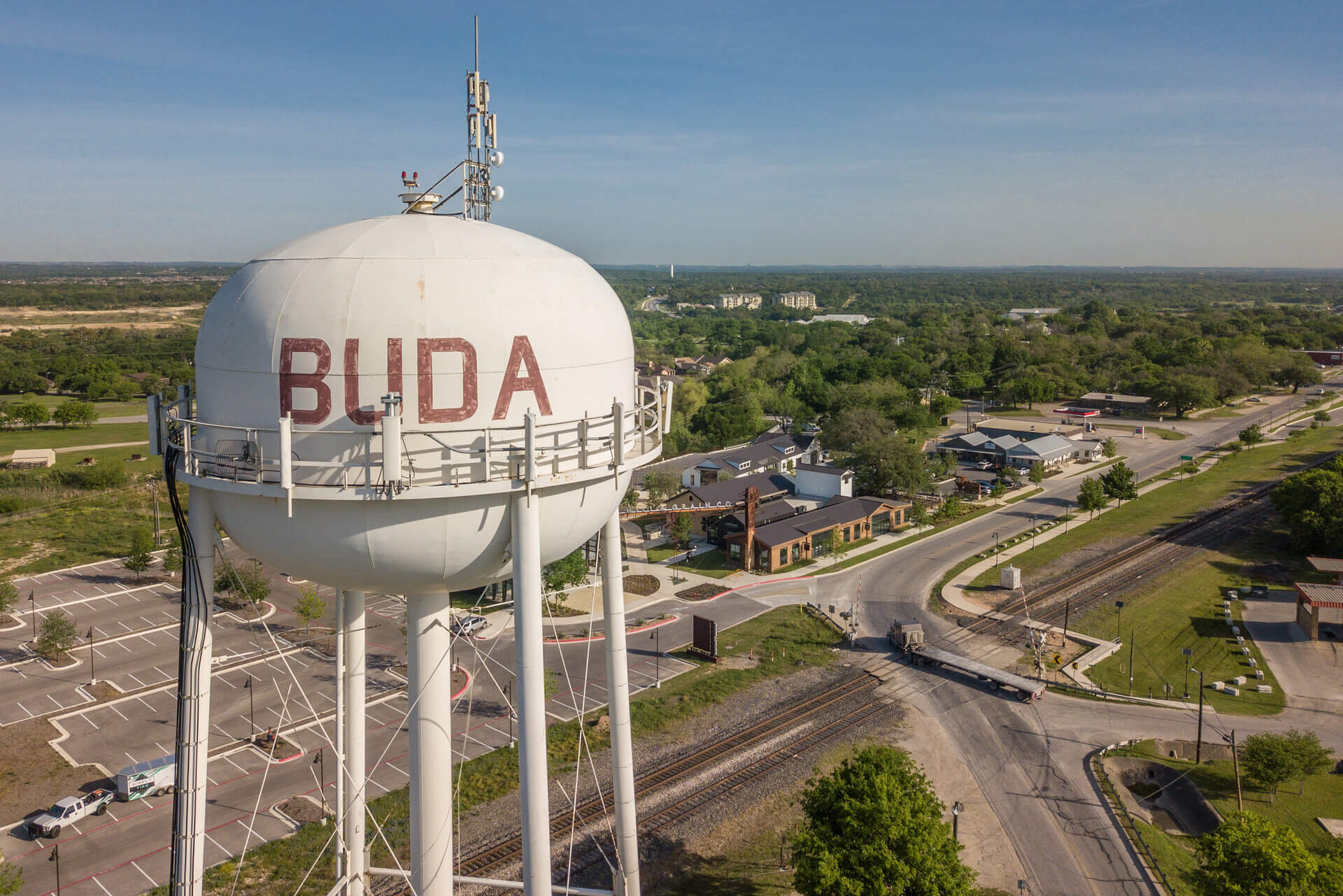 Lighthouse family therapy - Texas location page Buda town landscape with a tower cropped